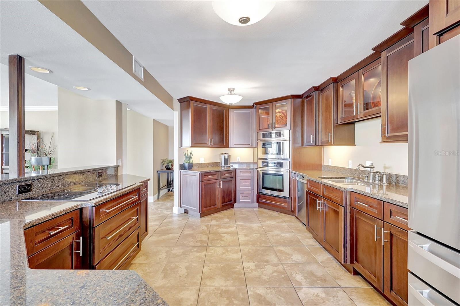 Enjoy entertaining for family and friends with this spacious kitchen with Stainless appliances, lots of counter space and open to the Living area