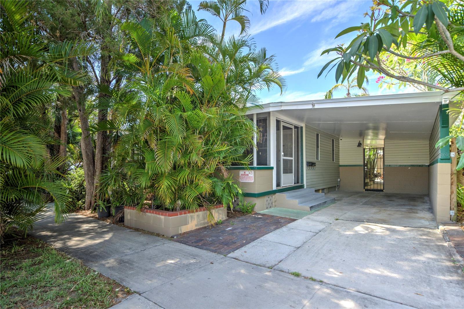carport and entrance to back yard