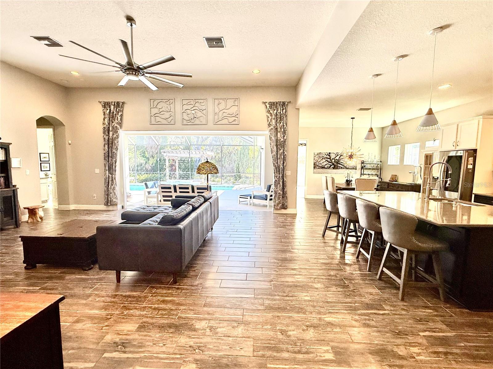 Open Concept; pocket sliding doors open up to the back patio