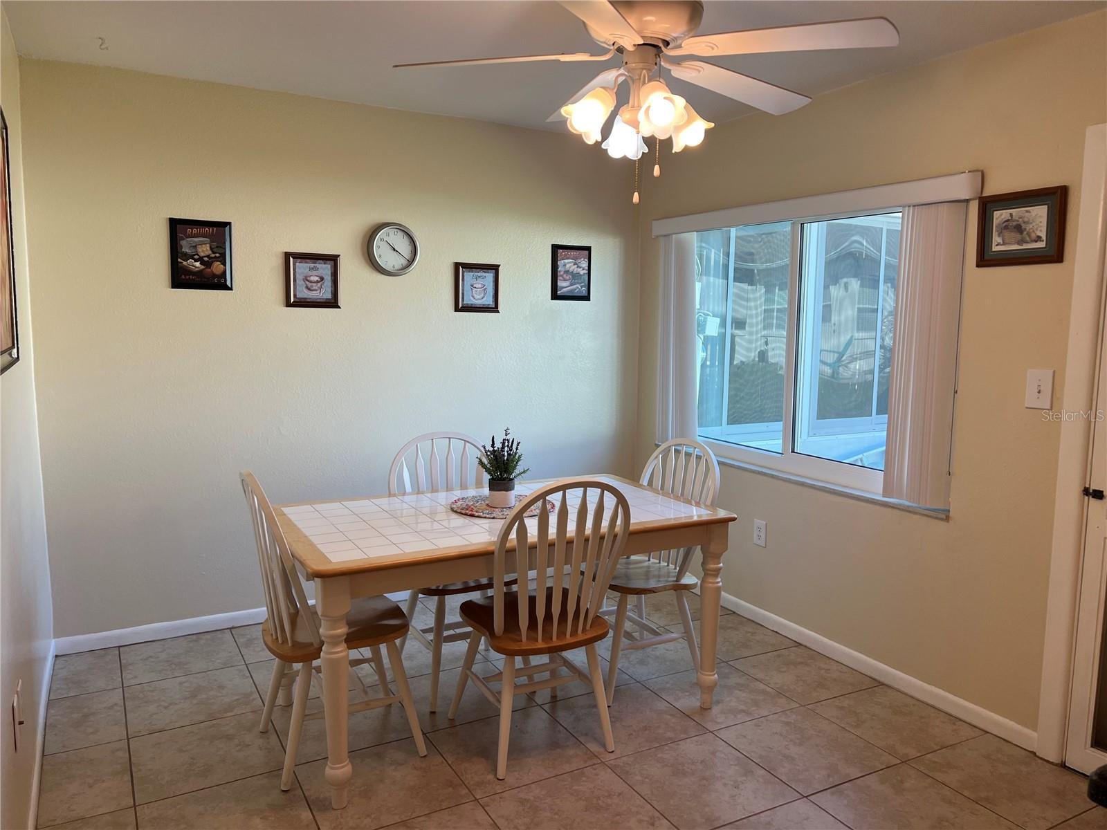 Tile Floors, Ceiling Fans, Screen Door to Rear