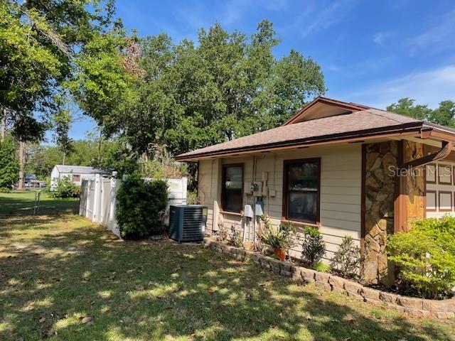 LEFT SIDE OF HOUSE BACK YARD