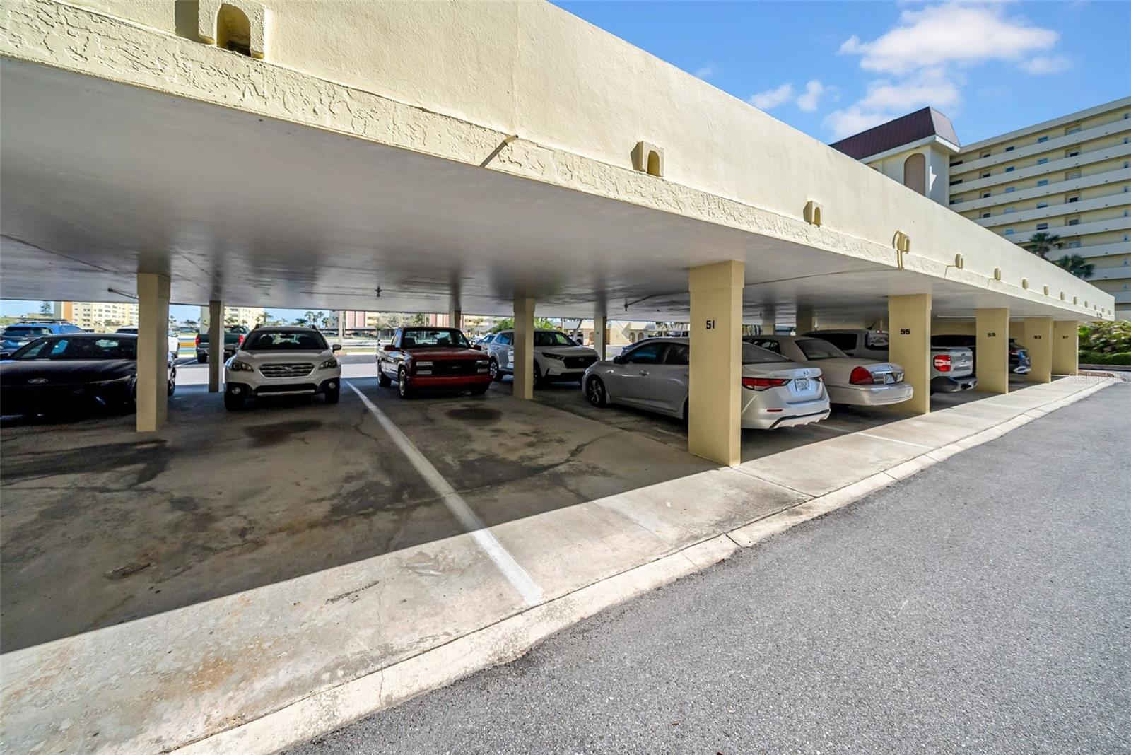 ASSIGNED COVER PARKING IN FRONT OF THE BUILDING