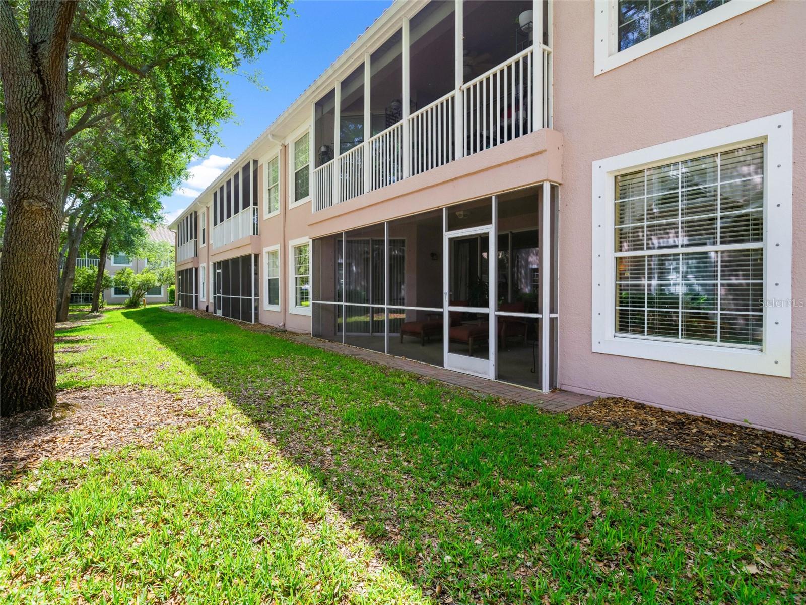 View of outside Area from porch, has more privacy as  this condo does not facedirectly  into living area of another condo.