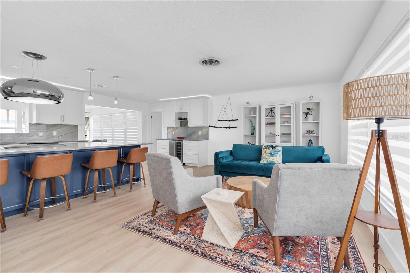 Open floor plan showcasing a gorgeous island kitchen and lots of big windows for natural light!