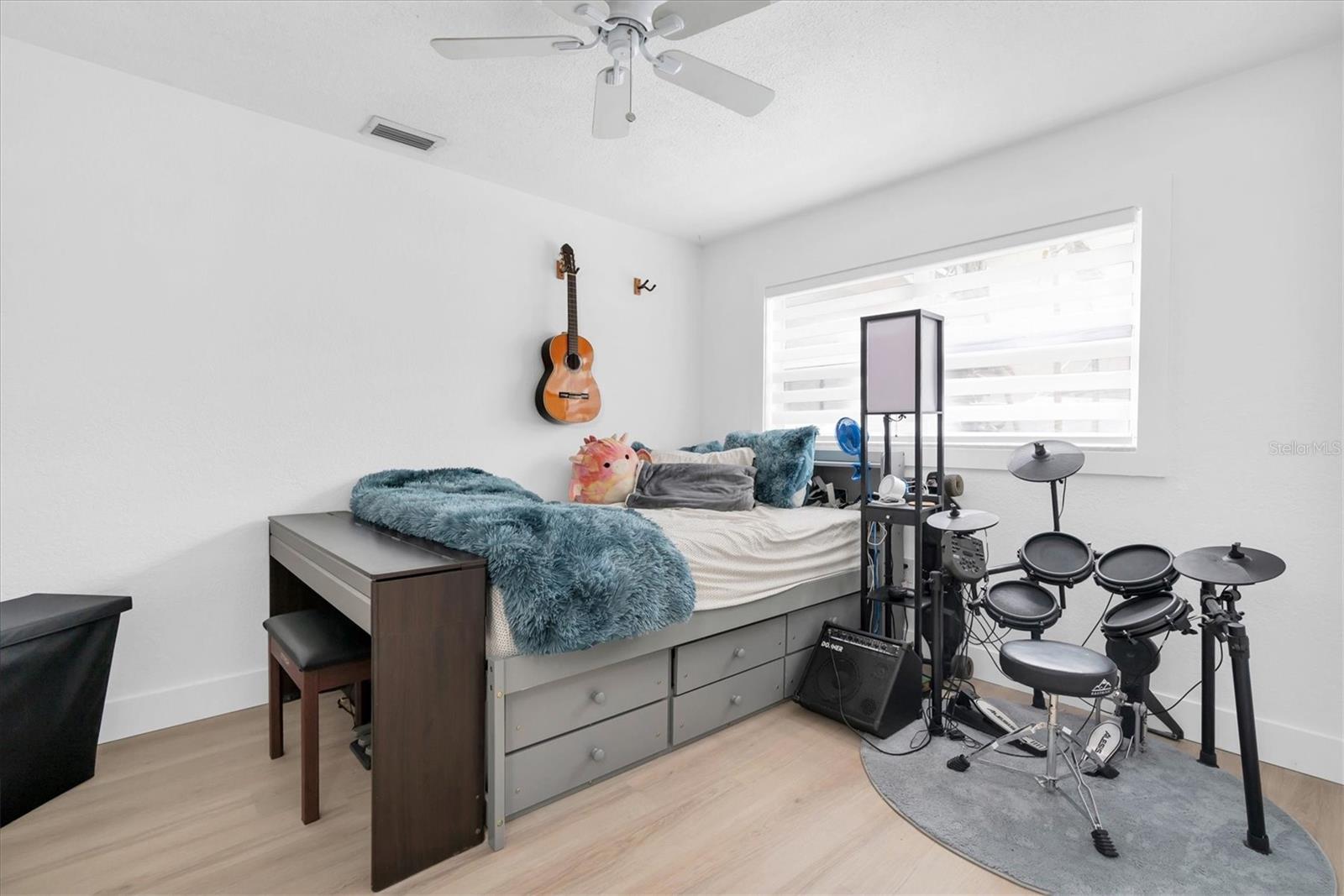 The secondary front bedroom with closet system by Closetivity.  Don't miss it on your tour.