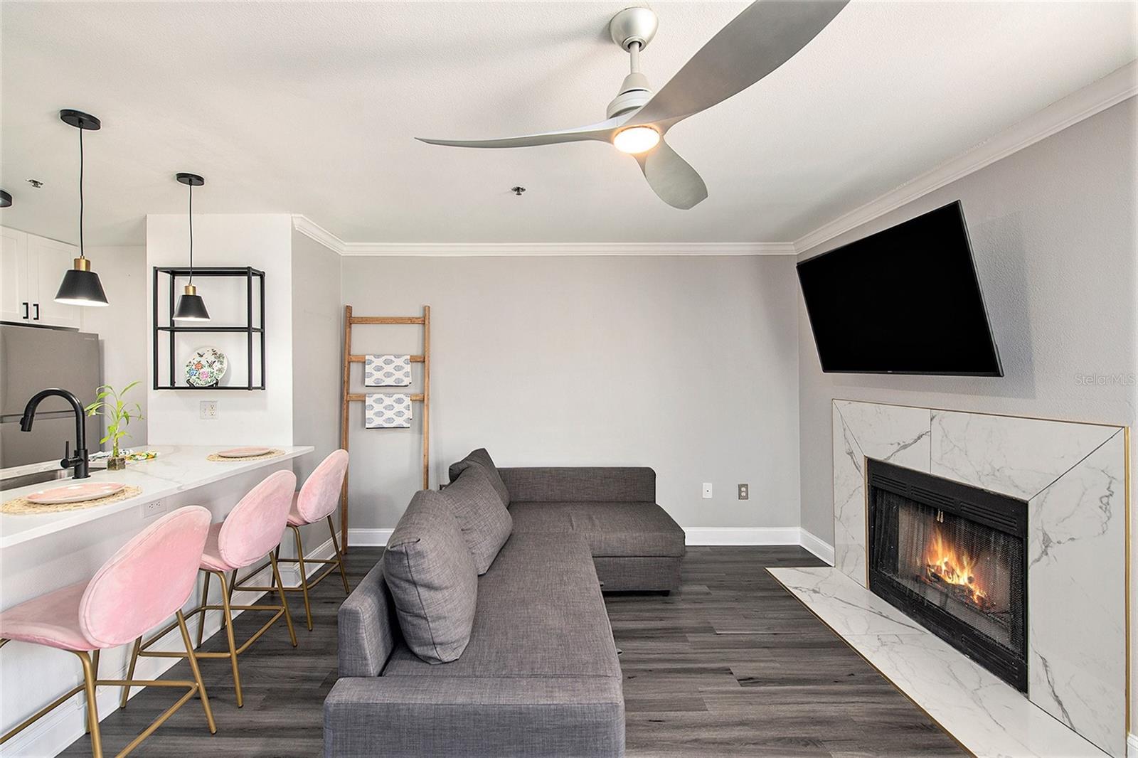 View of Living area and breakfast bar, fire place