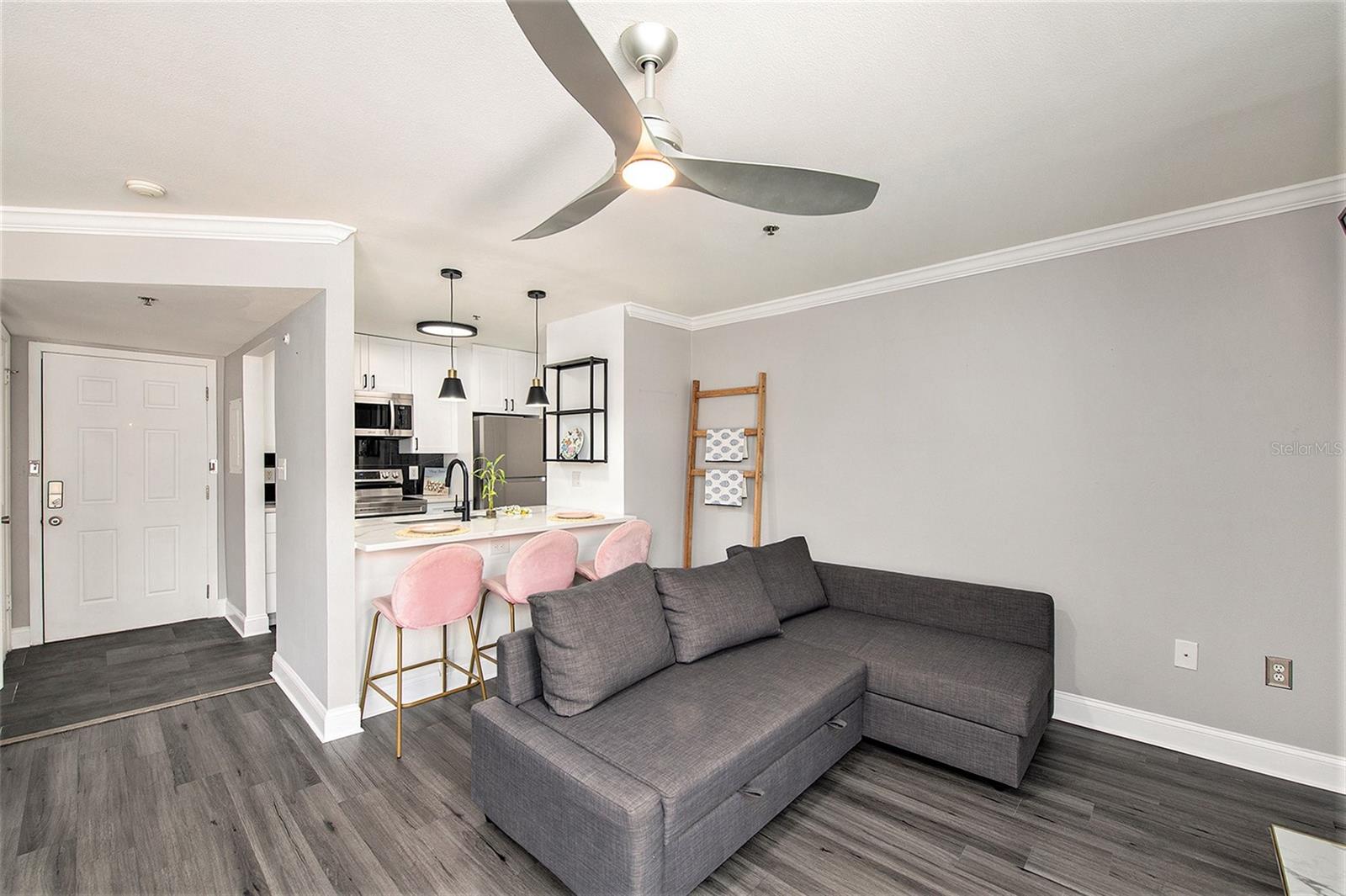 Wide view of living space and kitchen