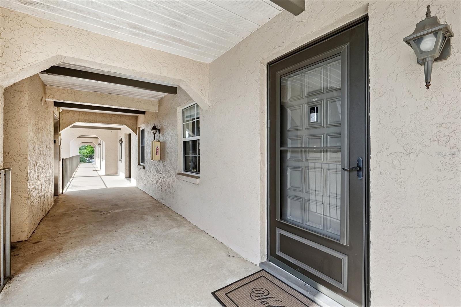 Screen, glass door entryway with ring camera!