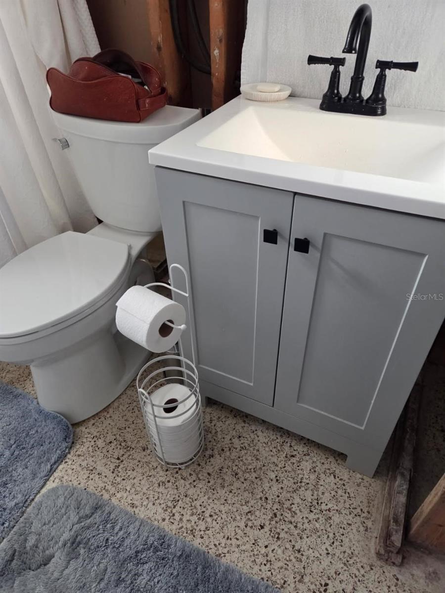 New vanity, current condition of bathroom