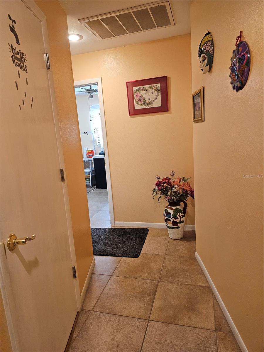 Half bathroom and hallway to Laundry room