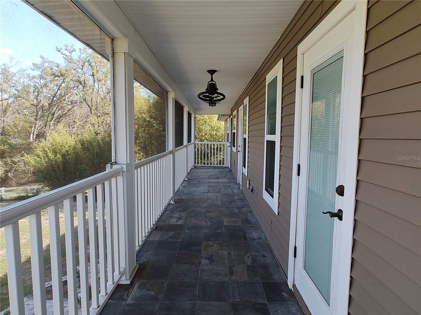 Upstairs screened rear porch