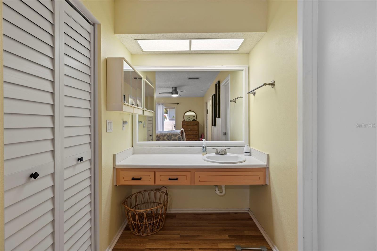 Additional vanity in bedroom