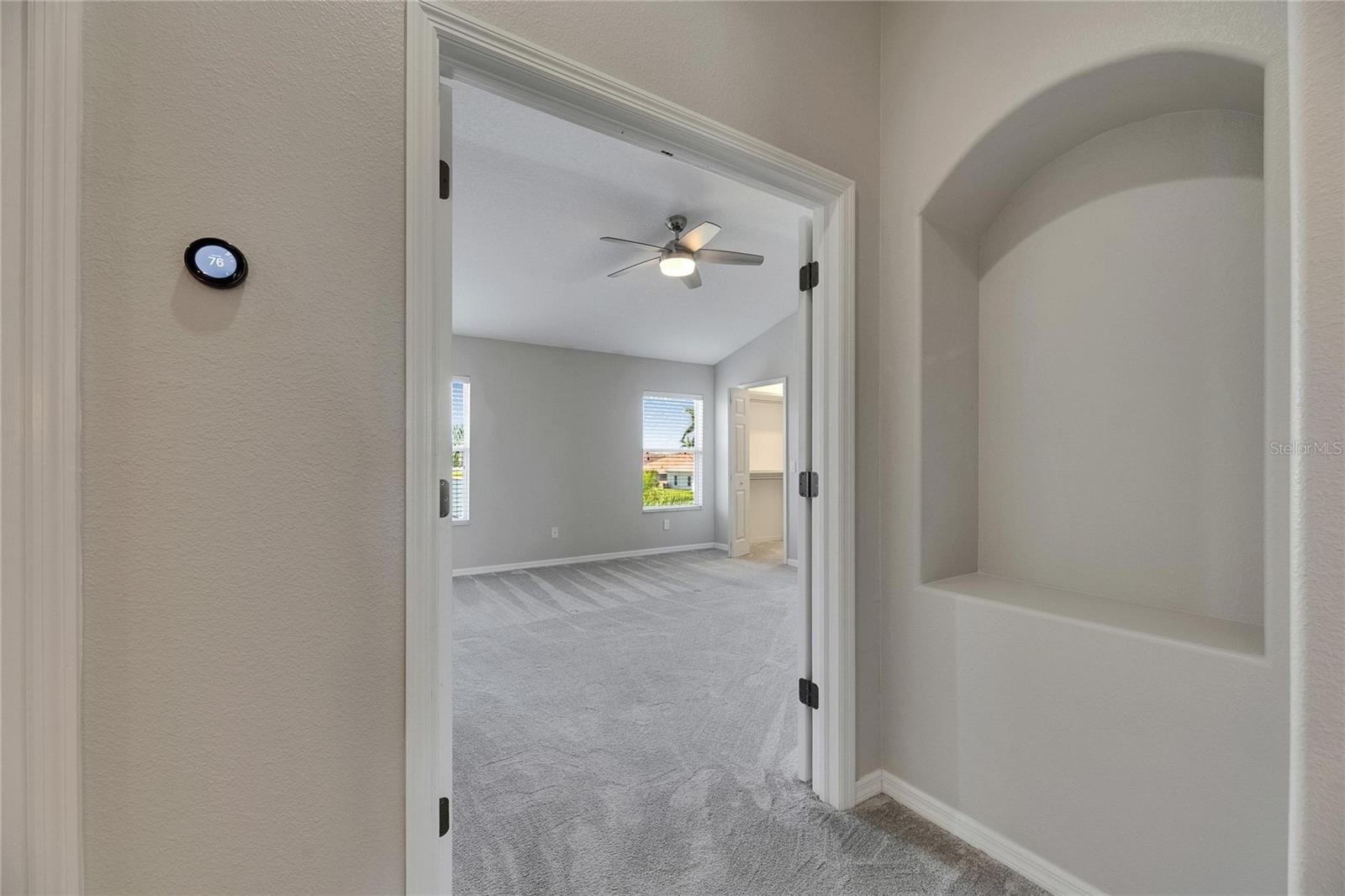 Double door entry to primary bedroom en-suite.