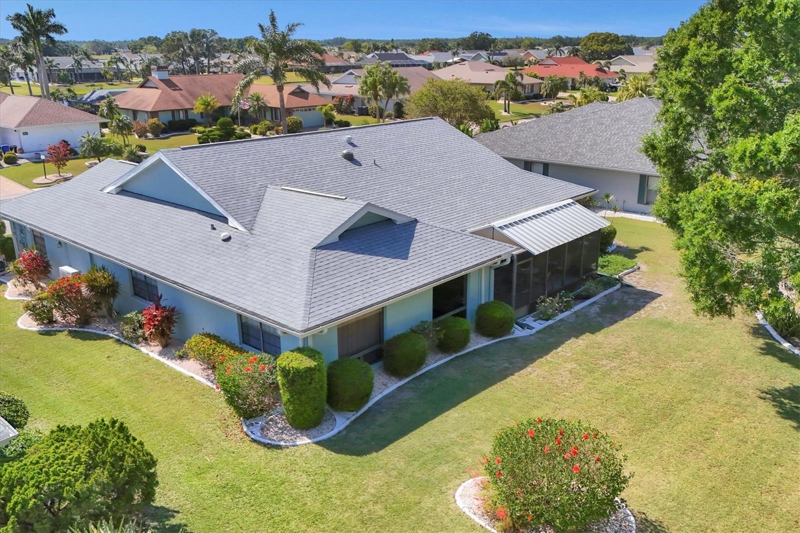 rear of home backs to Caloosa Golf Course