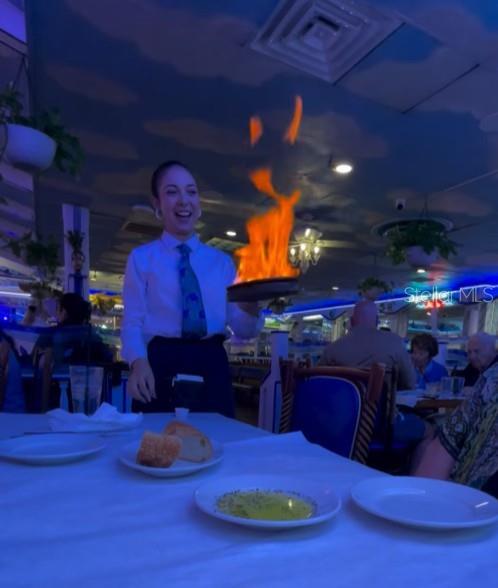 Opa! Serving Saganaki, our most famous appetizer!
