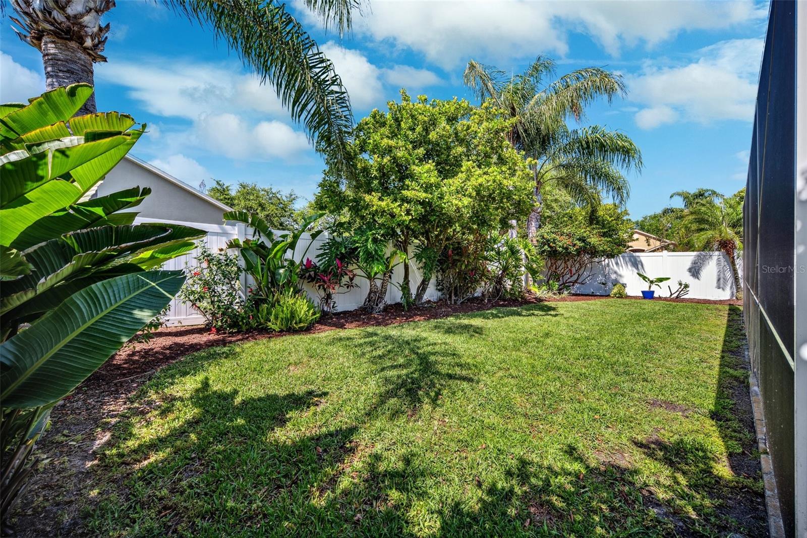Lush Landscaped Fully Fenced Backyard