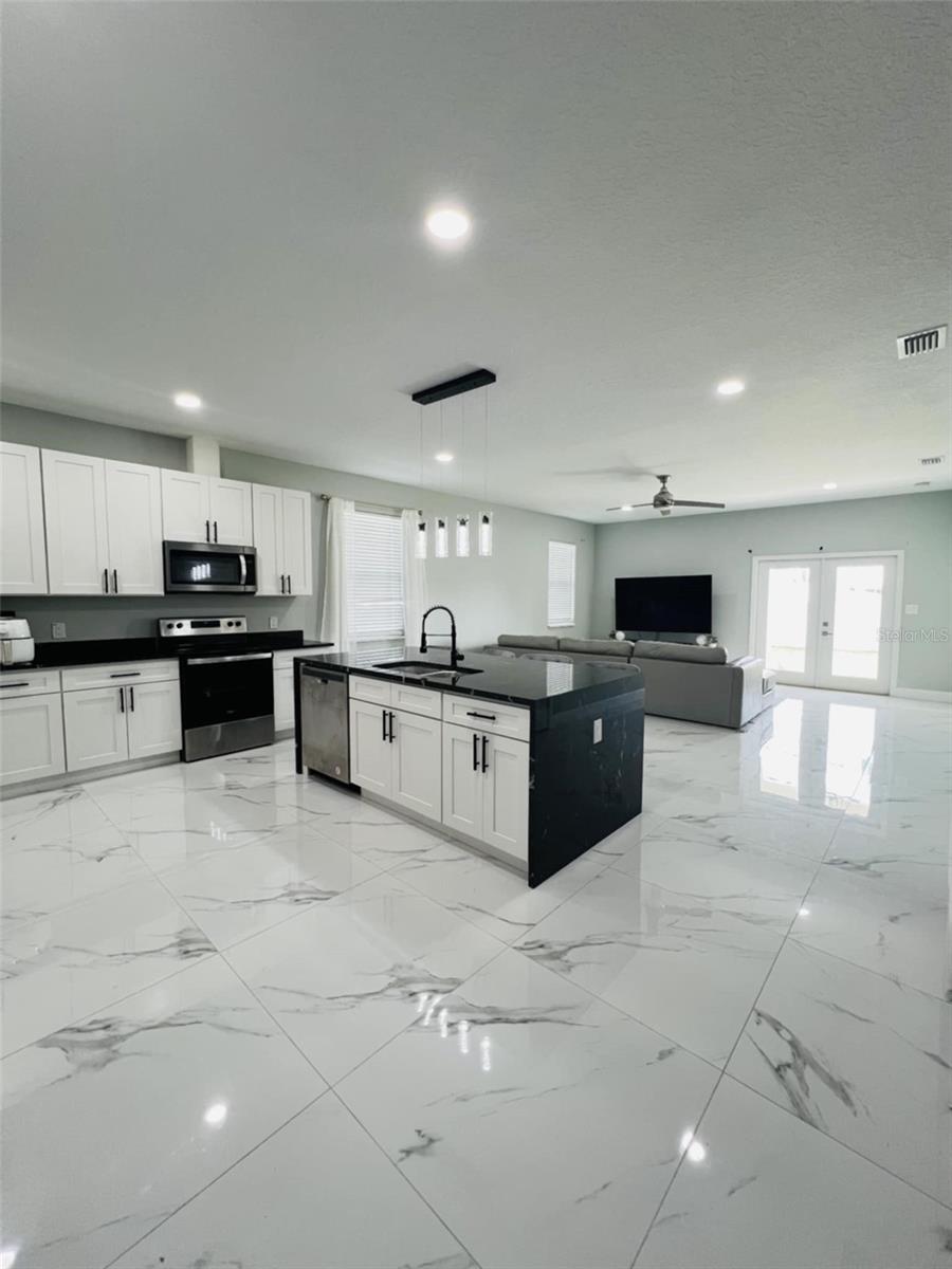 Kitchen + Island + Living Room