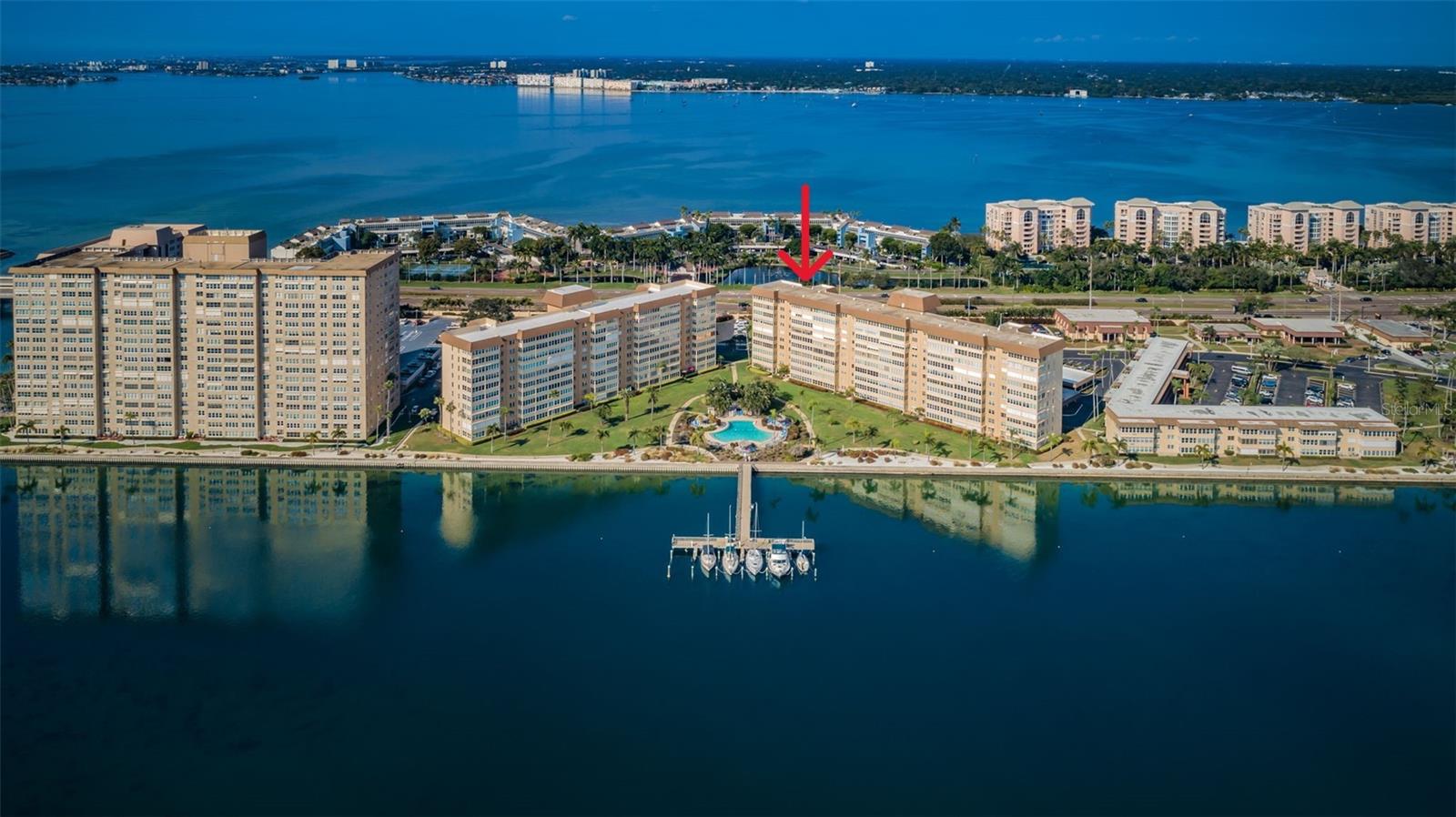 Tropical island settings and expansive water views are yours to enjoy from this spacious 1,602 Sq Foot Point Brittany condo with impact windows being sold fully furnished/turnkey.