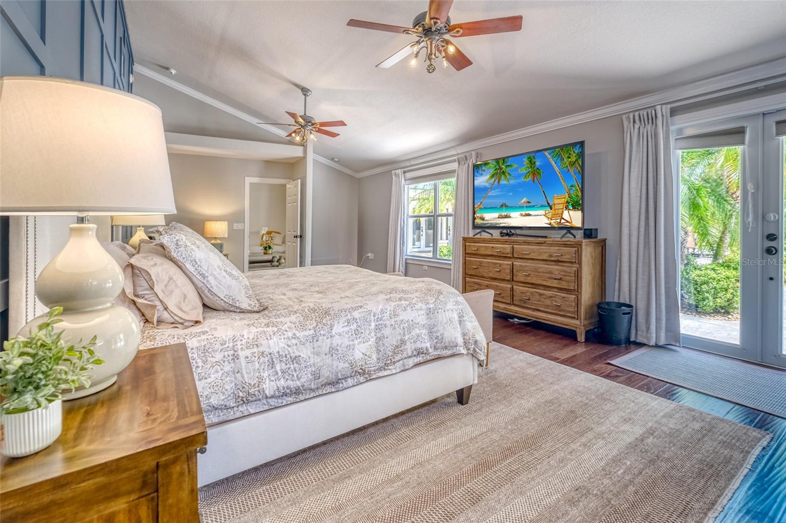 Primary Bedroom suite with exit to Pool area