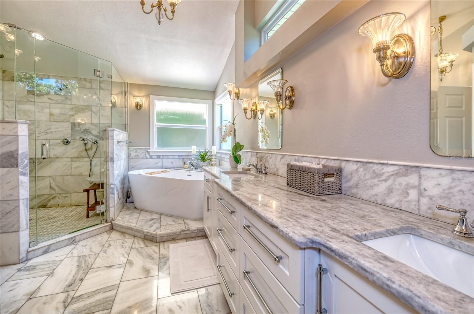 Primary with freestanding tub and walk in shower