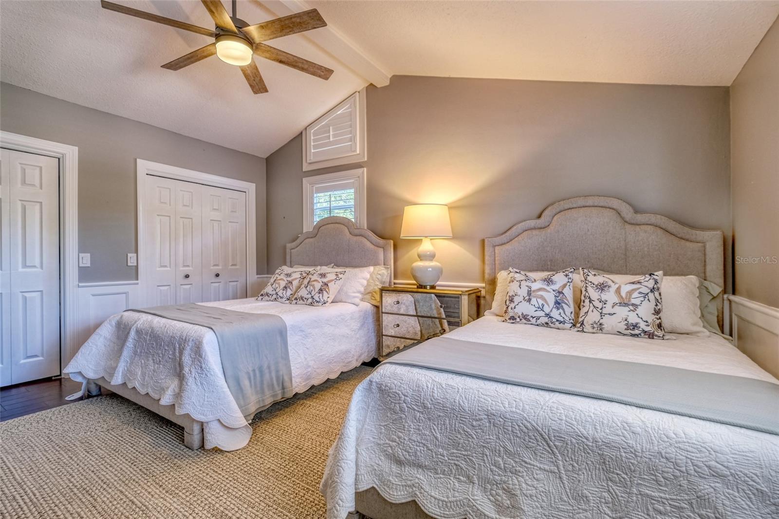 One of two upstairs guest rooms