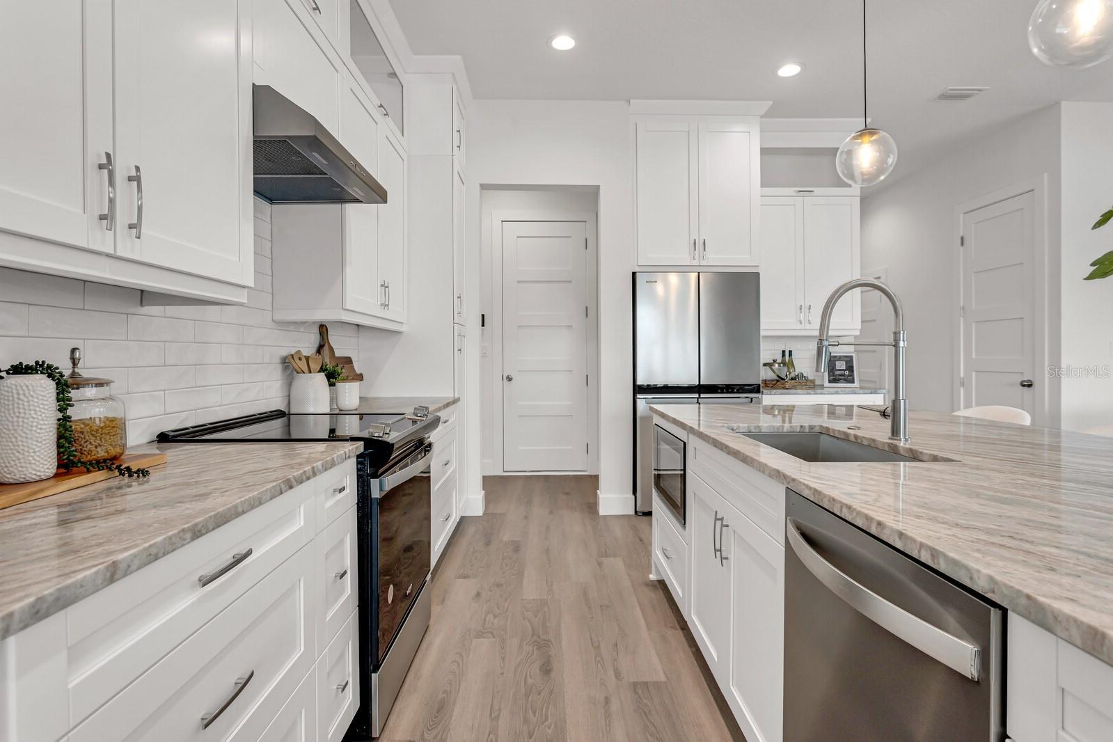 many of the photographs used in this listing are not of the subject property but are from unit 7 within the same neighborhood. These images are intended to provide a general representation of the layout and finishes. Actual features, finishes, and conditions of the subject property may vary.