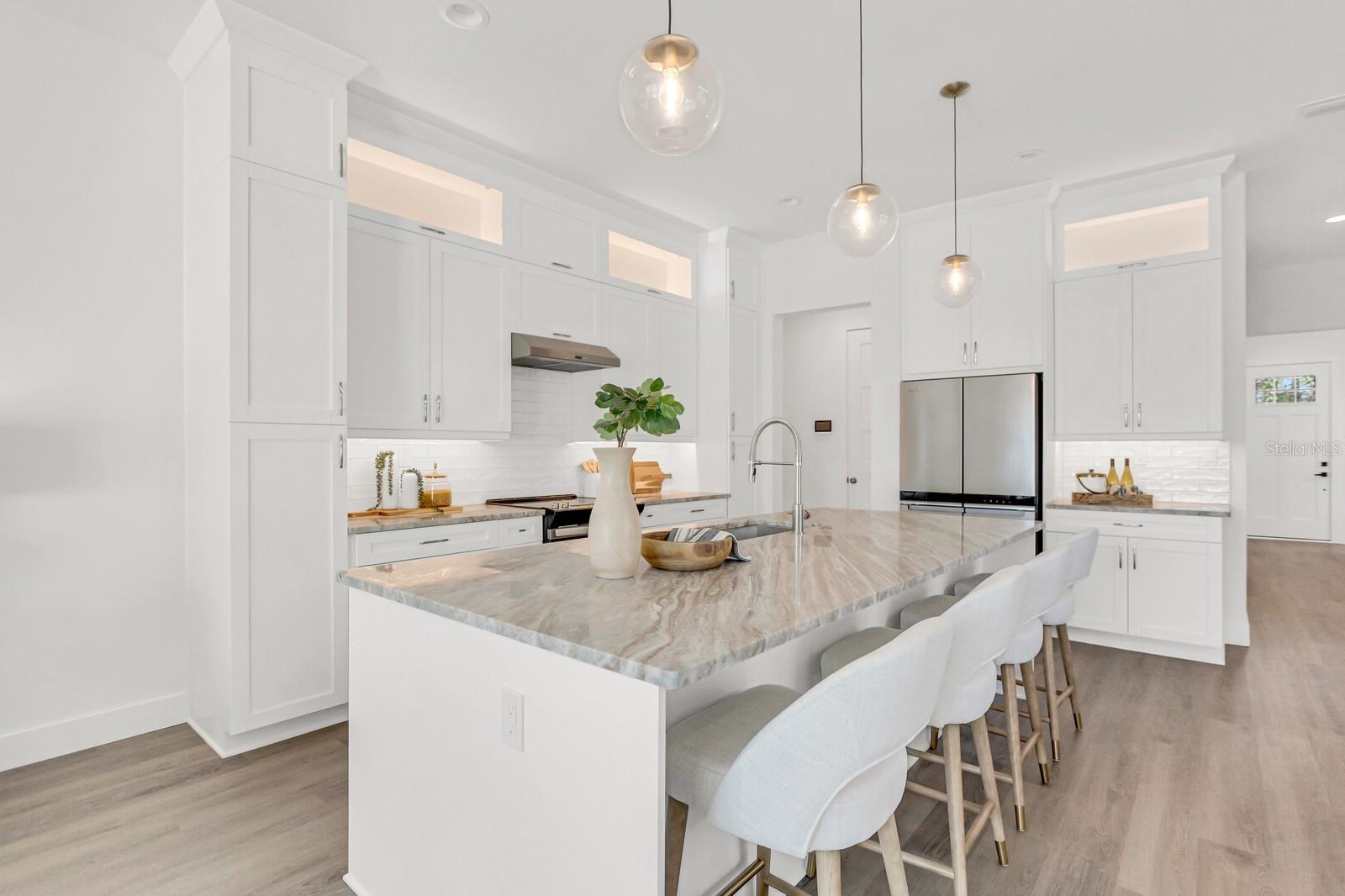 many of the photographs used in this listing are not of the subject property but are from unit 7 within the same neighborhood. These images are intended to provide a general representation of the layout and finishes. Actual features, finishes, and conditions of the subject property may vary.