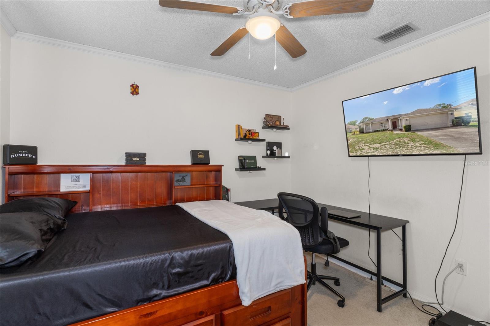 Notice the large fan/light in this room