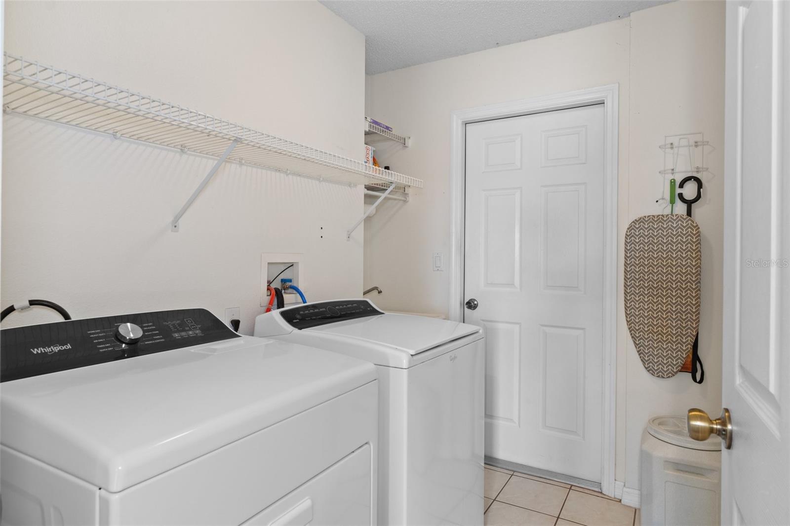 Convient Inside Utility Room for your washer and dryer ( this washer and dryewr do not convey )