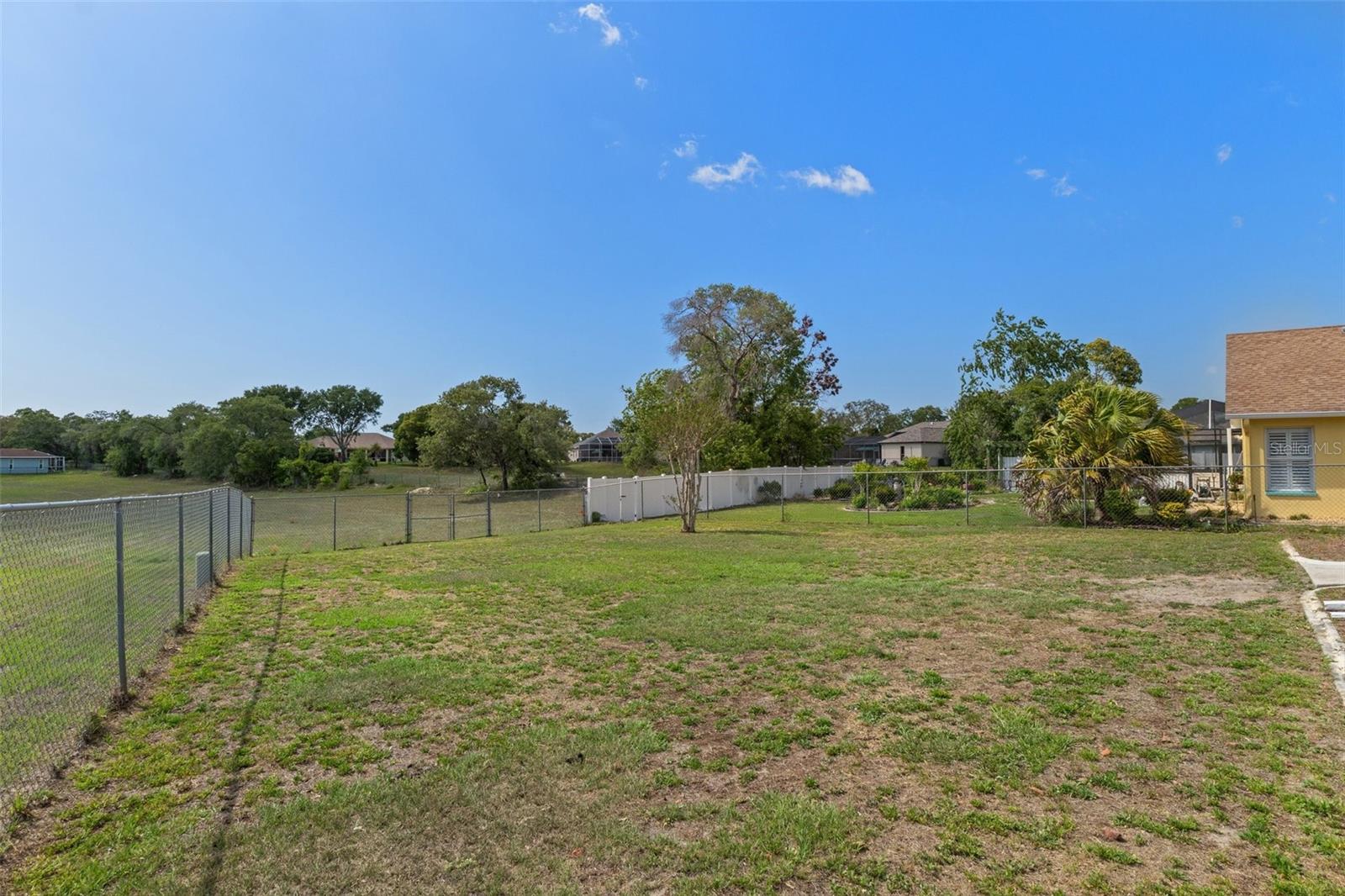 Chain link fencing surrounds the property