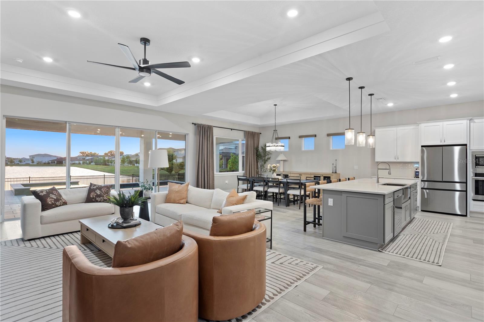 Spacious open layout for entertaining with sleek kitchen and sunlit living area views!