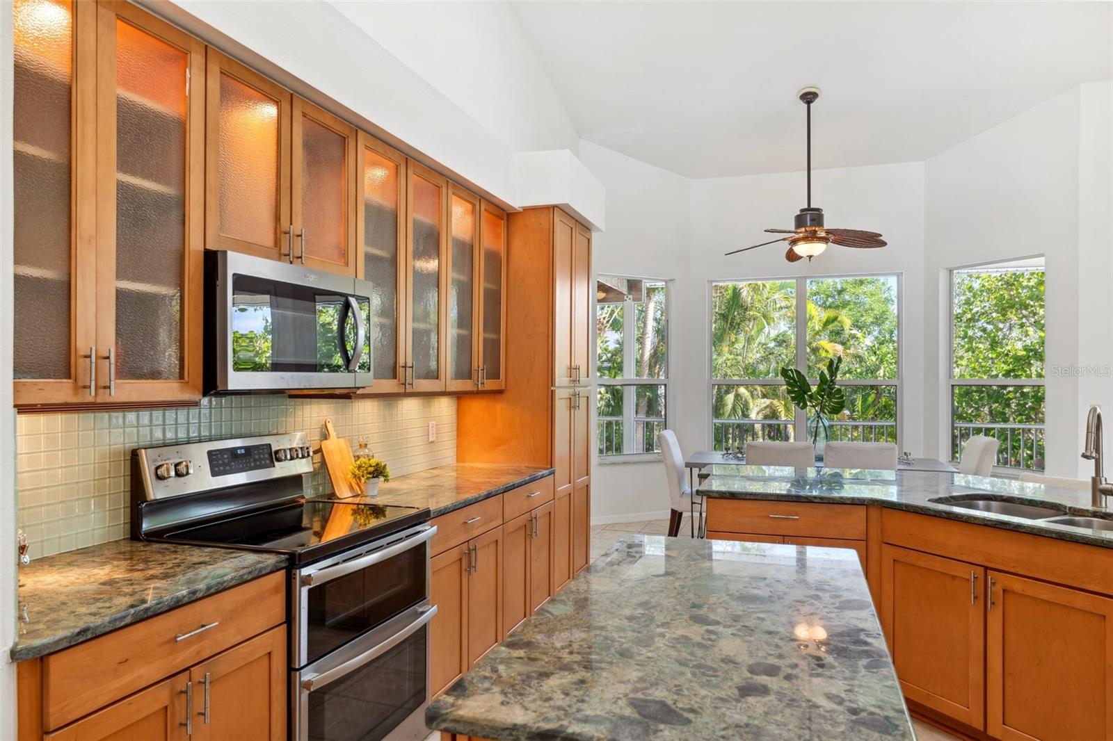 Spacious Kitchen with Decorative Glass Cabinets
