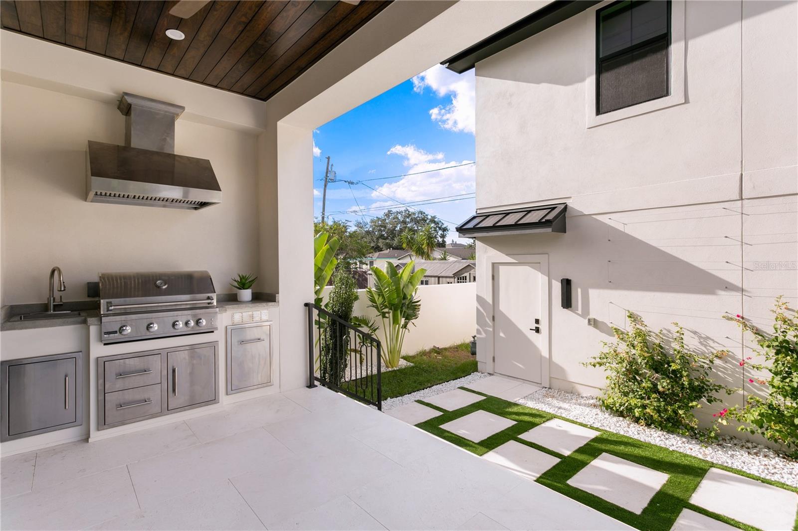 Outdoor kitchen with gas grill