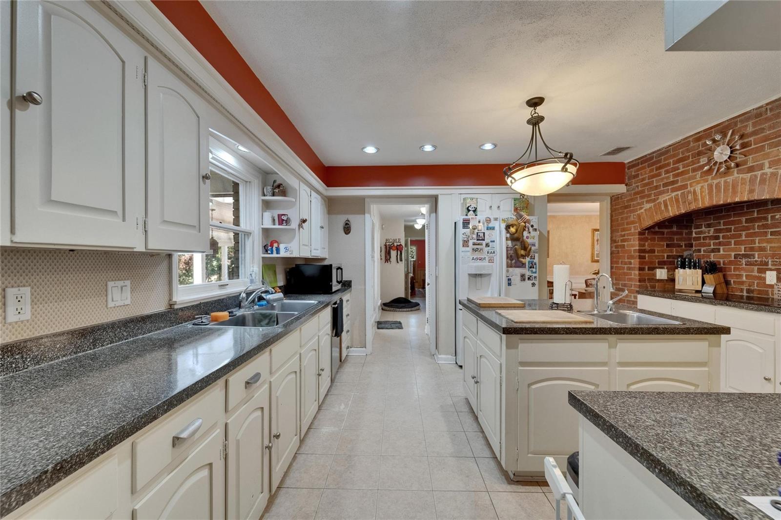 Massive Kitchen with Center Island and Breakfast Bar/pass-through to Dinette area