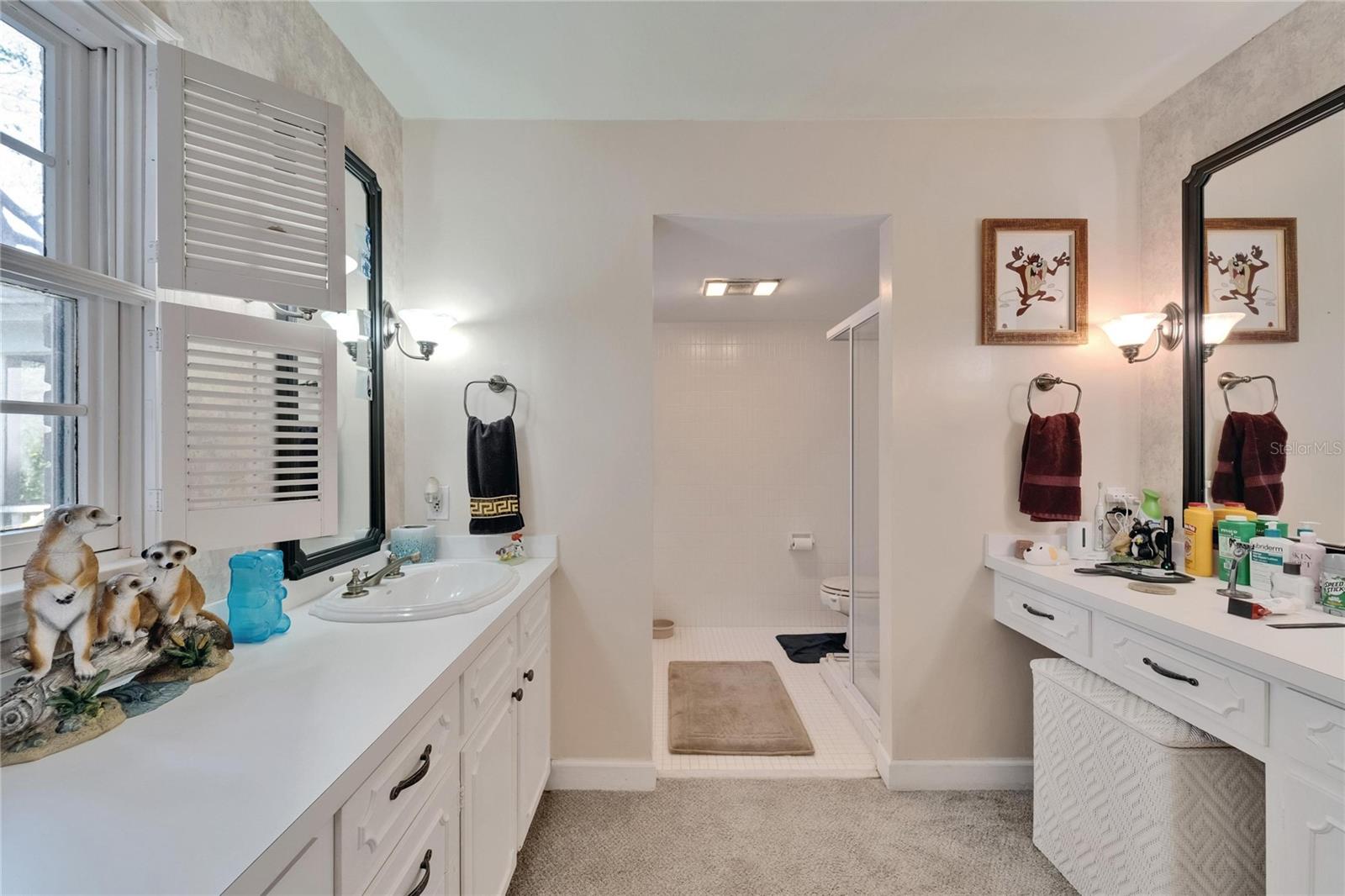 Primary Bathroom with split vanities