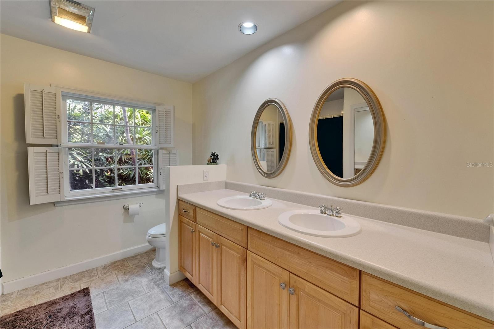 Guest Full Bathroom (tub with shower and dual vanities)