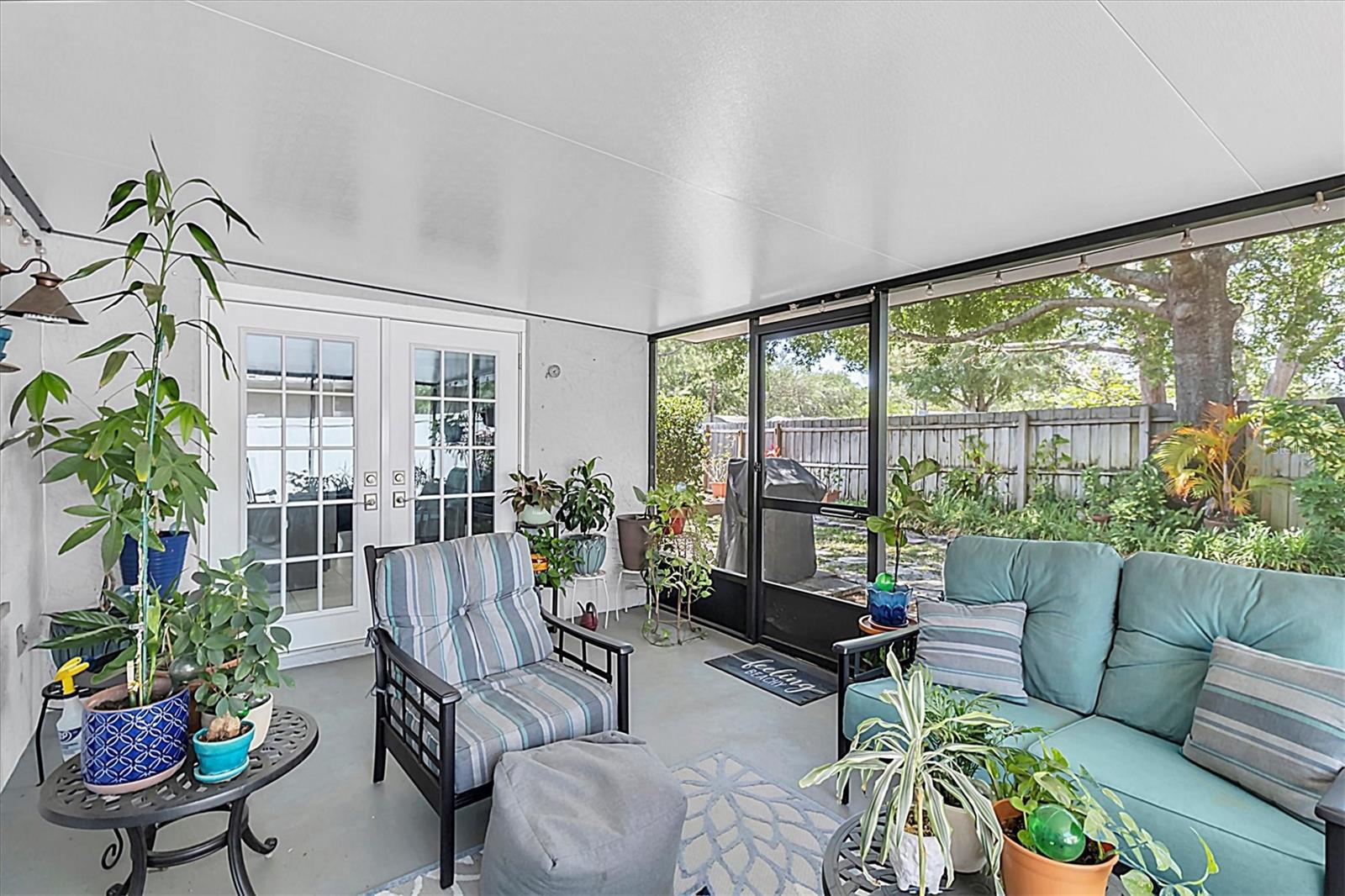 Screened In Porch with new Hurricane rated Anderson doors.