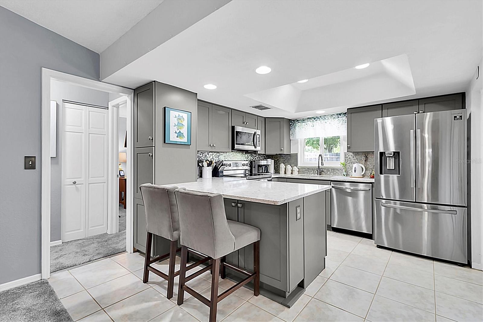 Newly updated kitchen with beautiful granite counter tops.