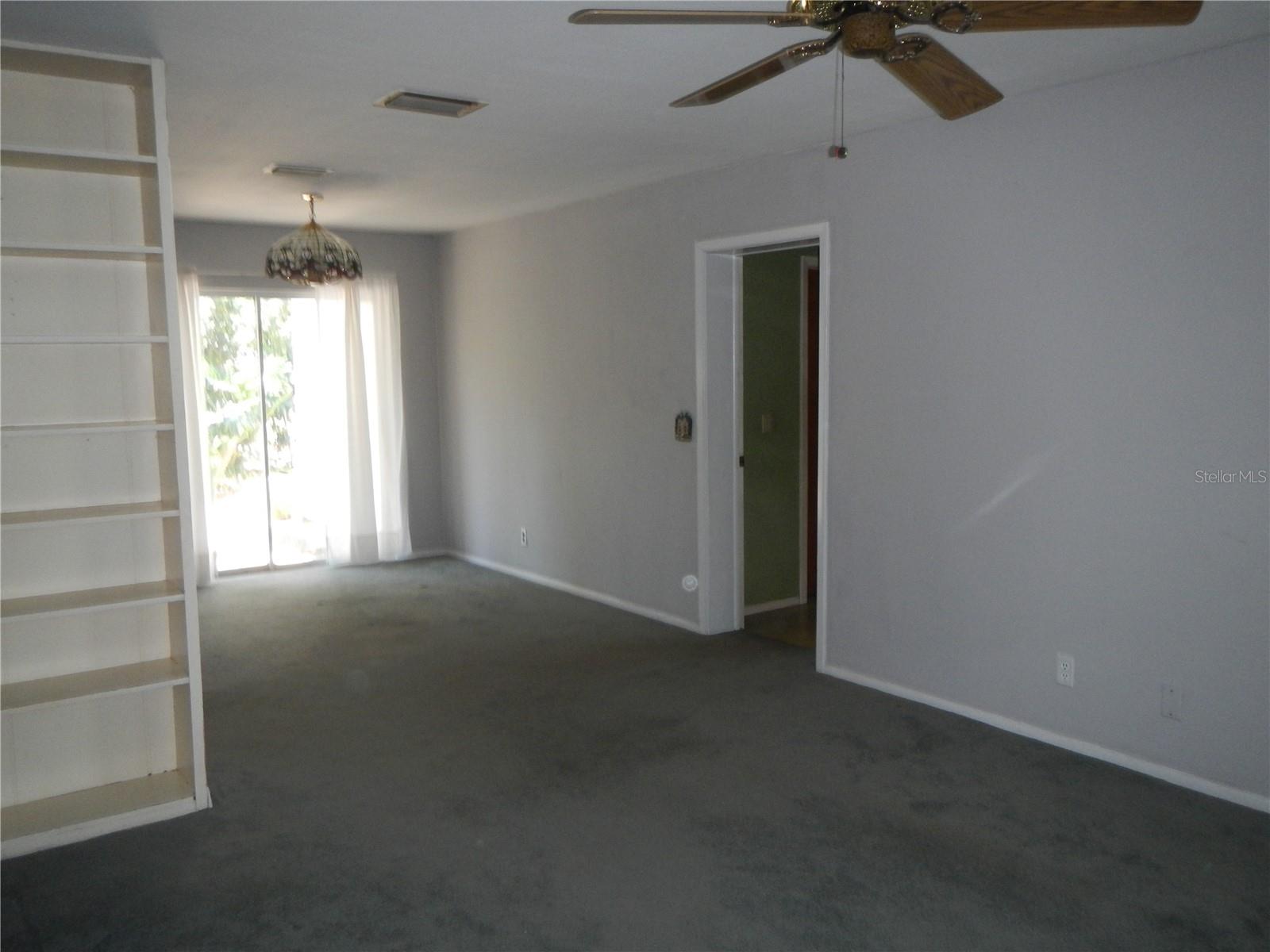 Family Room and Dinette     with door leading to half bath, laundry room and garage.