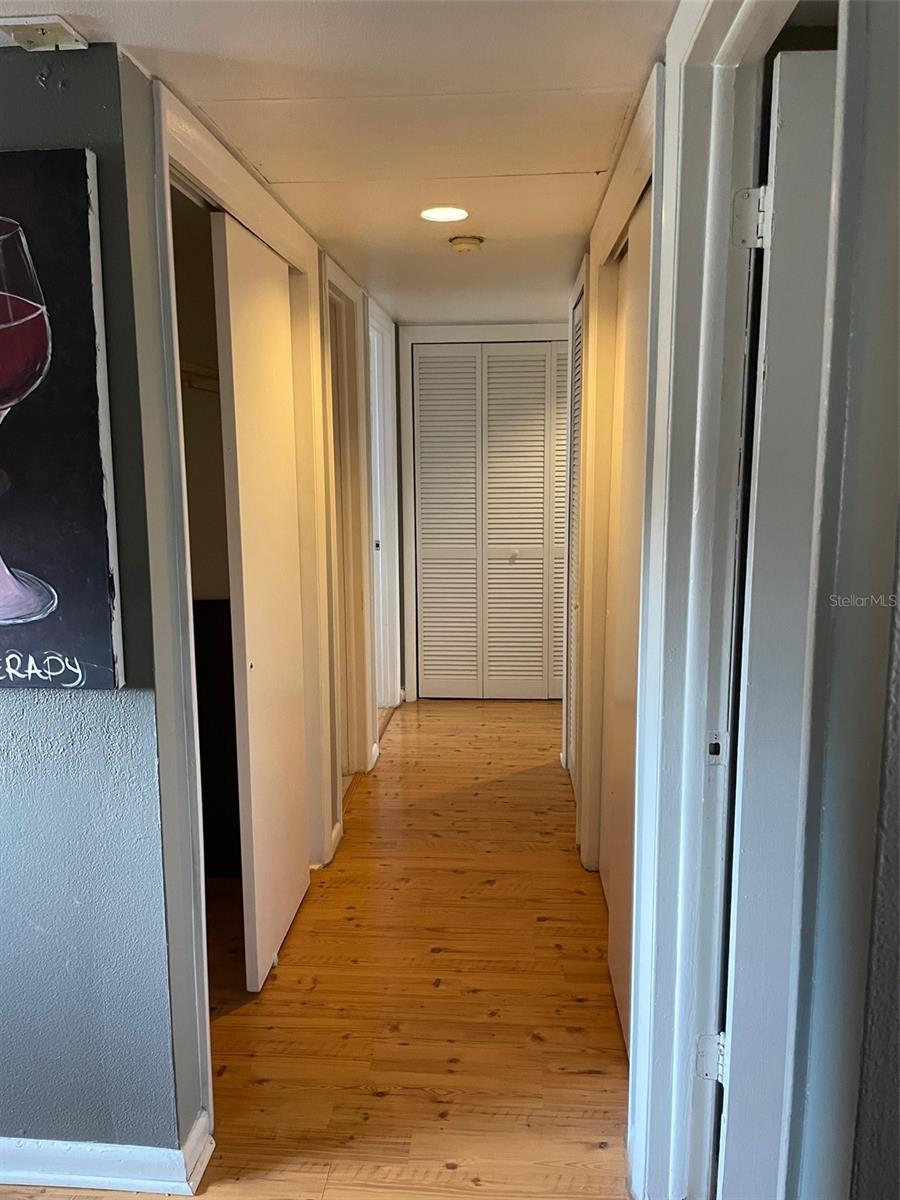 Hallway to bedrooms and hall closets