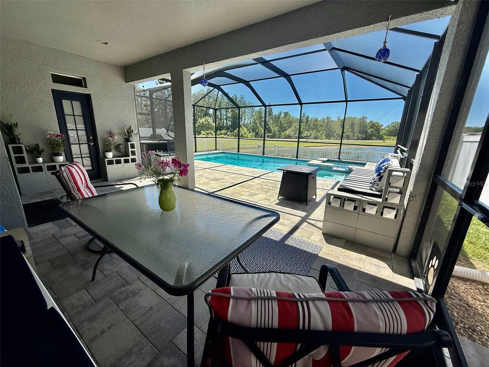 Salt water pool & spa with covered area.