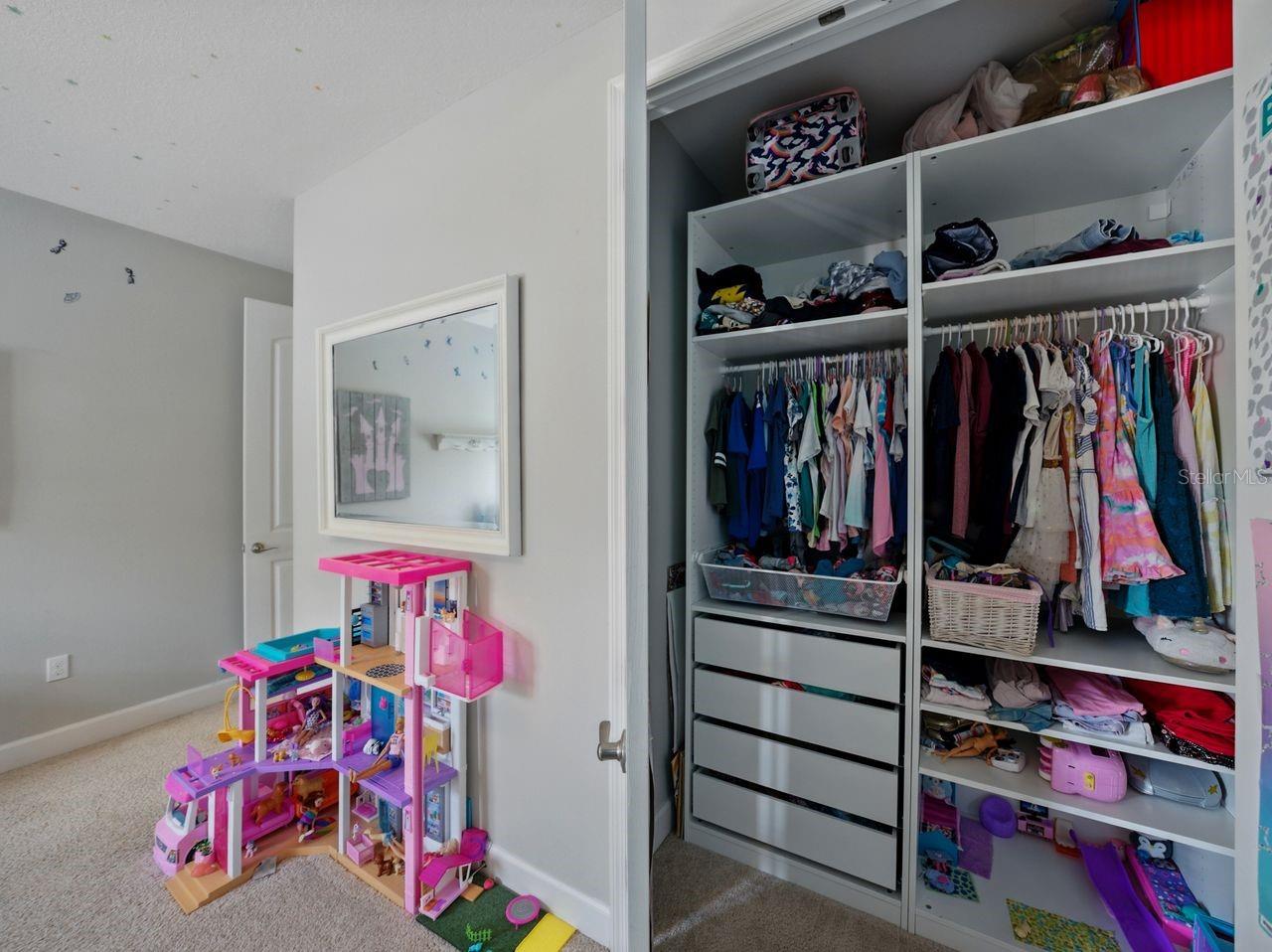 Bedroom 2 custom closet storage.