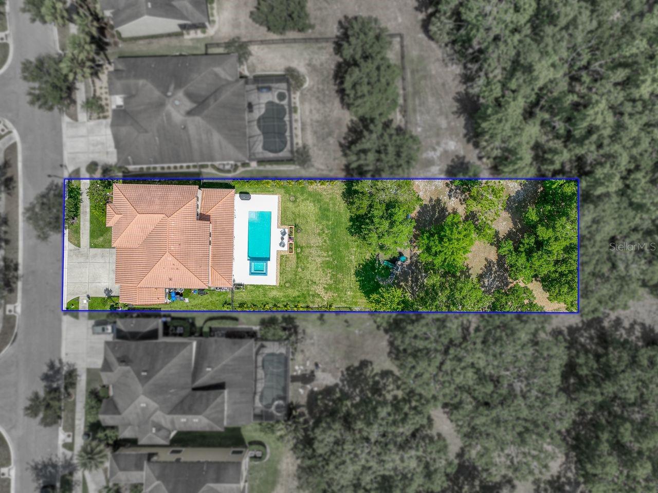 Large conservation lot offers lots of privacy with beautiful, wooded landscape view.