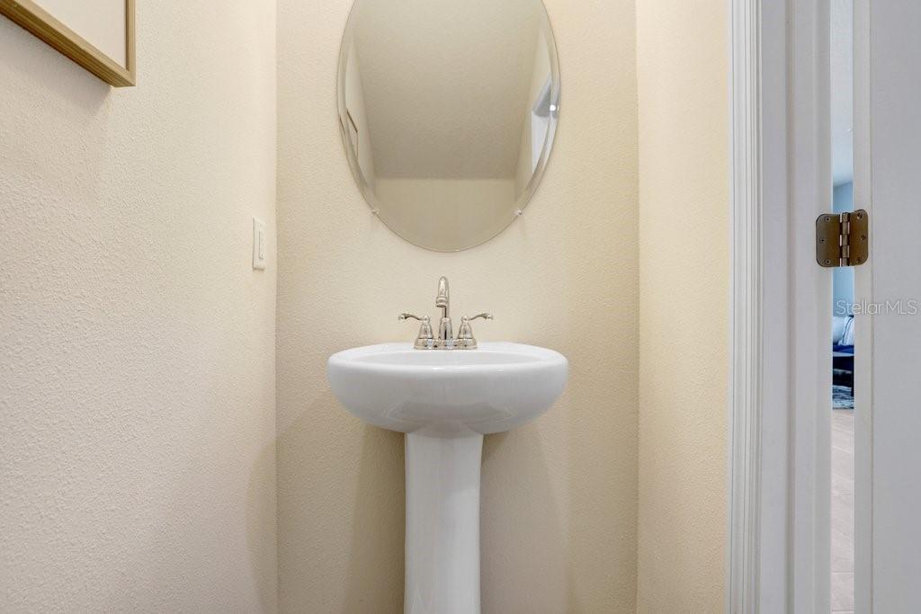 Downstairs Half Bath (photo of staged model)