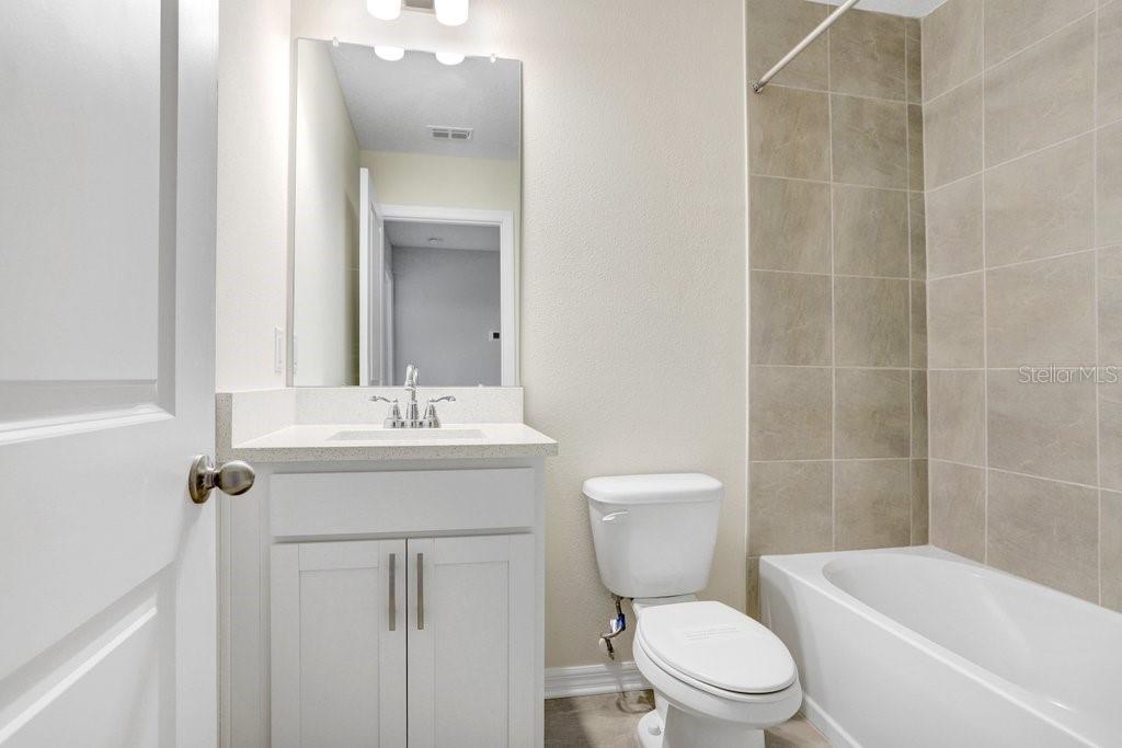 Hall Bath (photo of staged model)