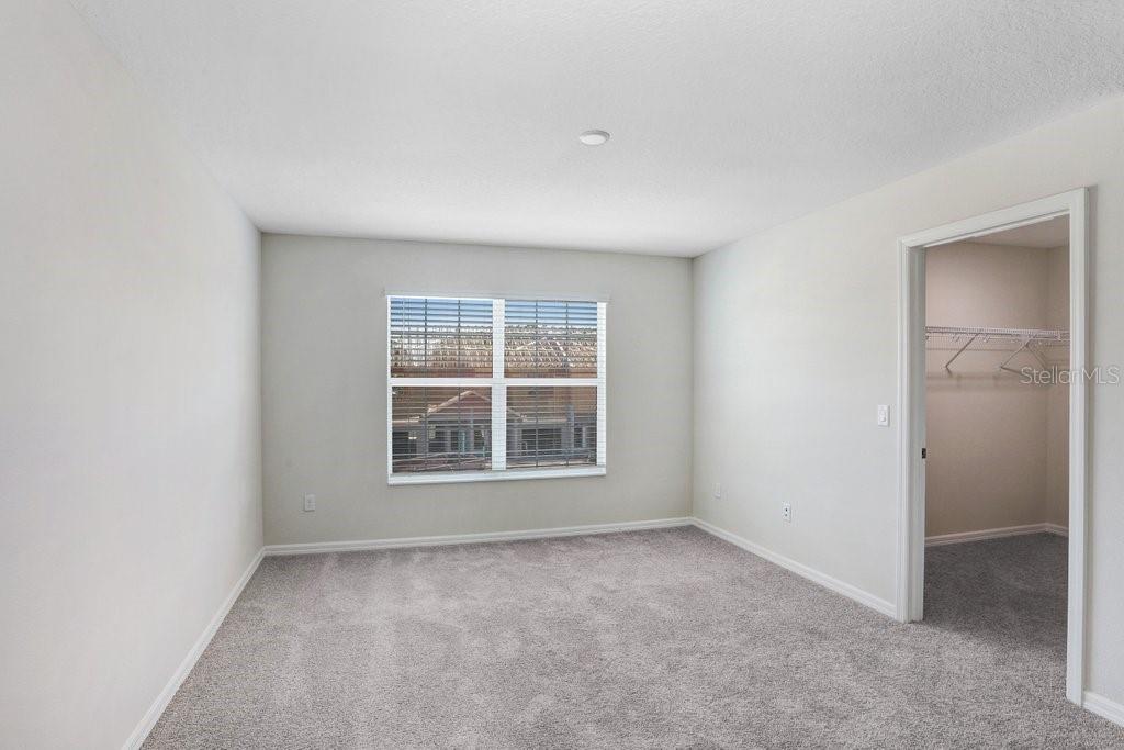 Primary Suite with Big Walk in Closet (photo of staged model)