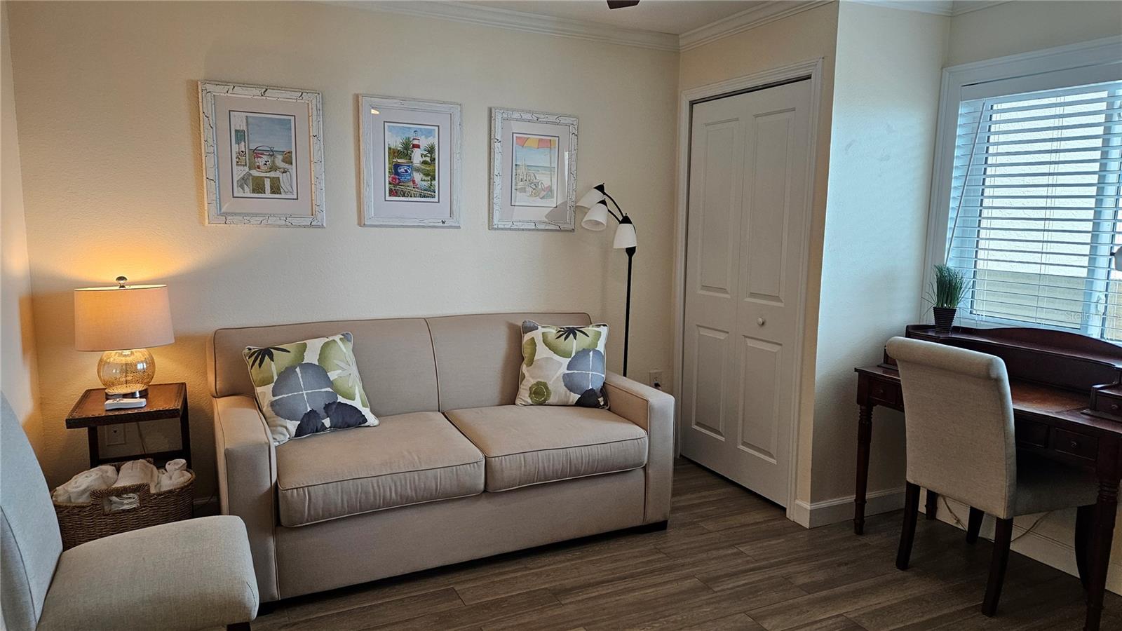 2nd bedroom with sleeper sofa and desk