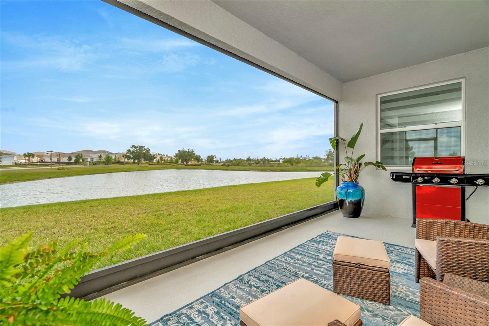 Covered and 20/20 Screened Lanai with water view