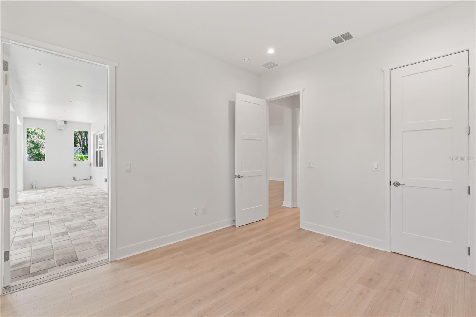 First Floor Primary Suite with Lanai Access