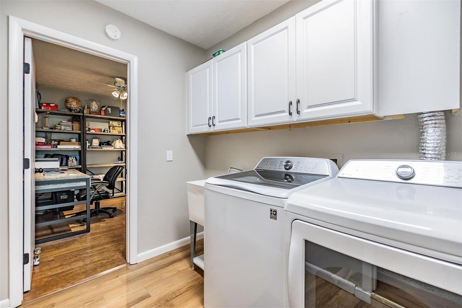 Laundry Room w Utility Sink and Storage
